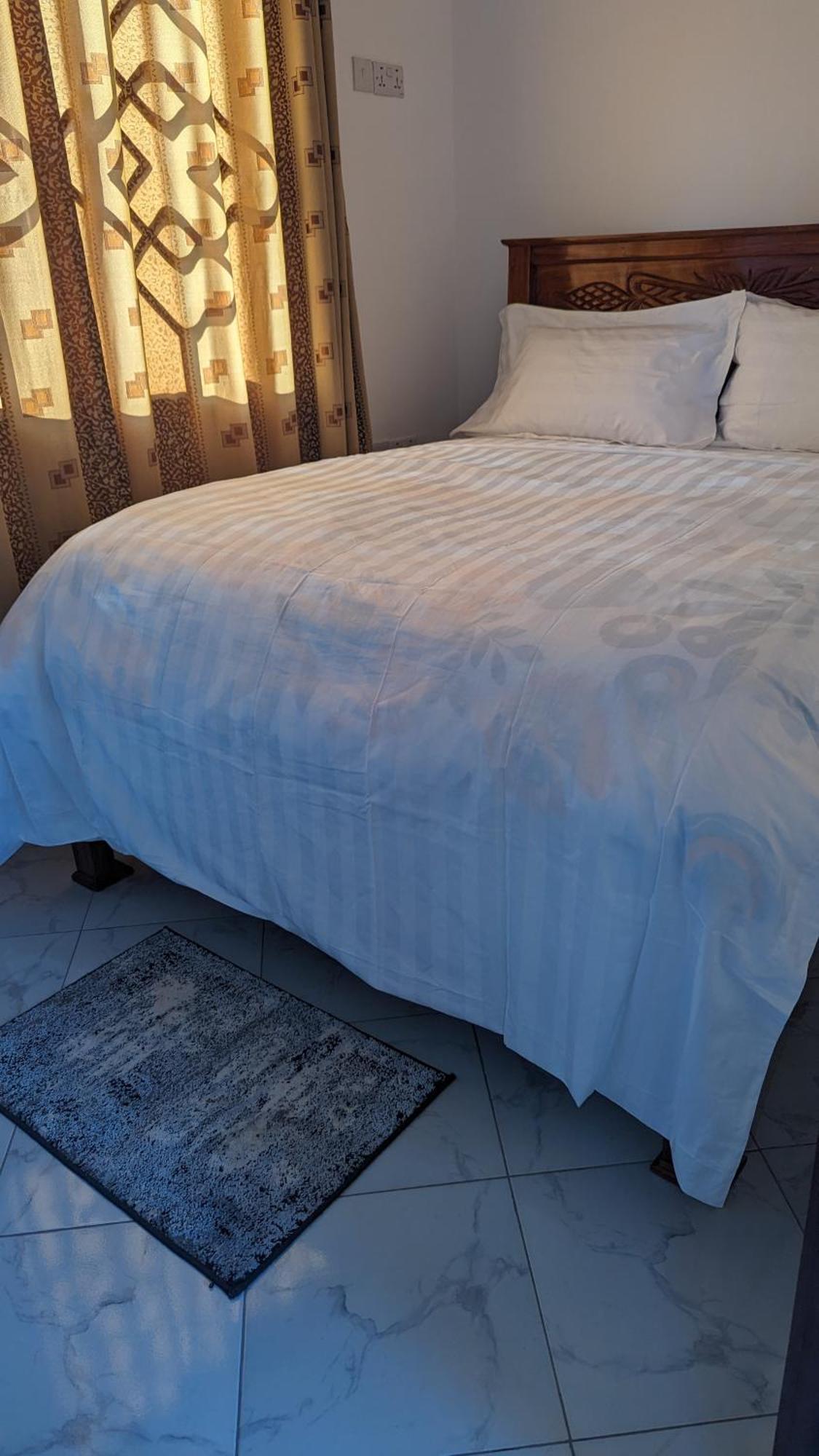 Mufasa City Hostel And Apartments アルーシャ 部屋 写真
